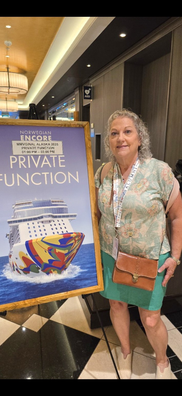 Gina Renee smiling during a private group event aboard Norwegian Encore, reflecting on growth, confidence and discovering what comes next.